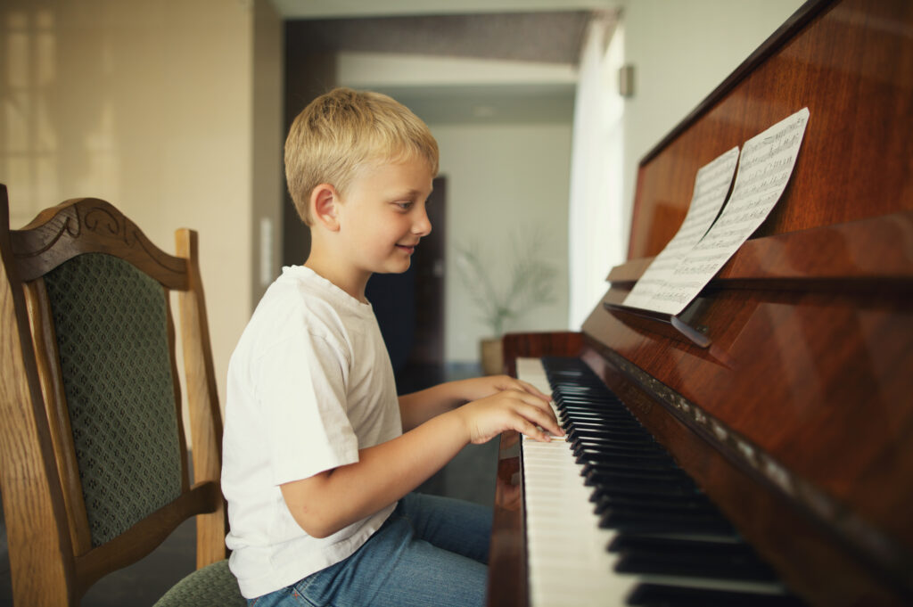 Boy Plays Piano