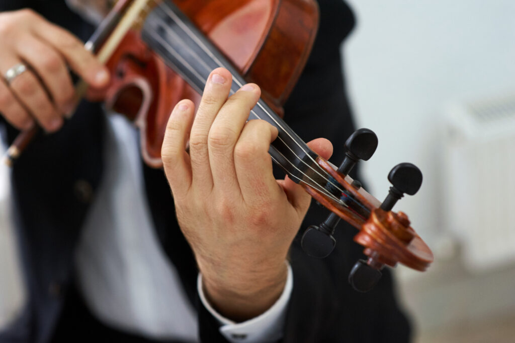 Men Violinist Playing Classical Violin Music